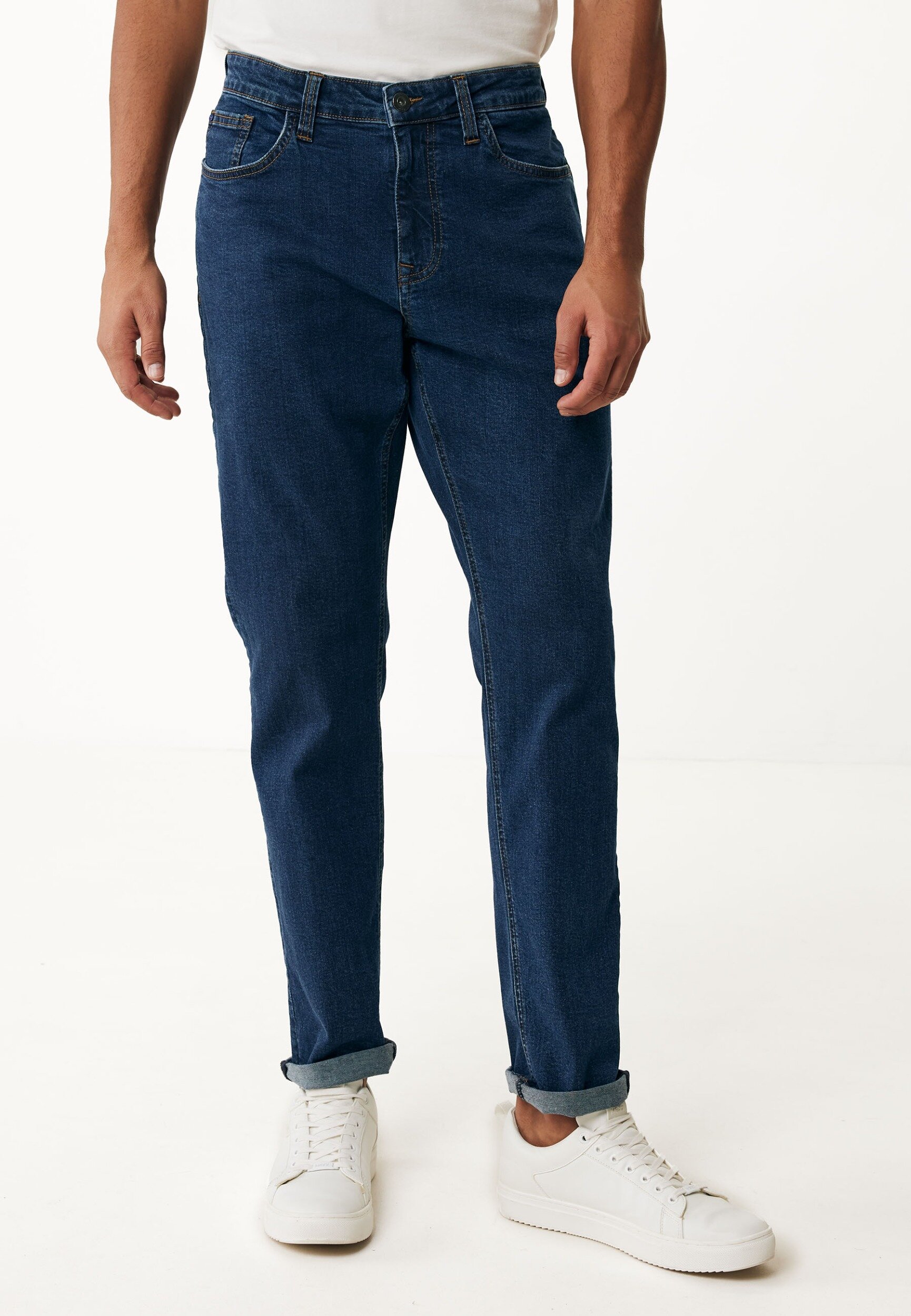 Jim Mid Waist / Tapered Leg Jeans